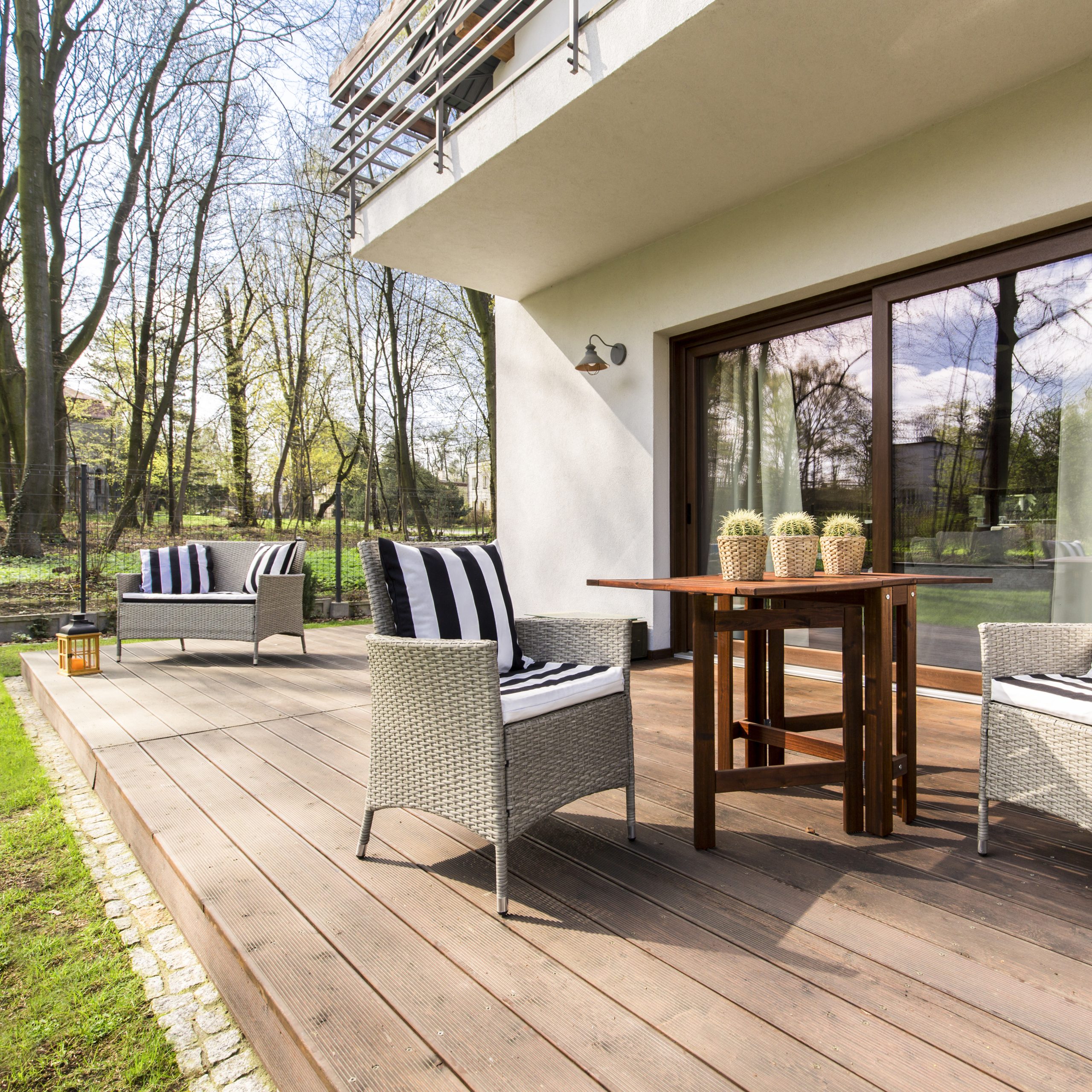 Timber porch with chairs and a coffee table